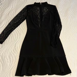 Beautiful detailed black dress.